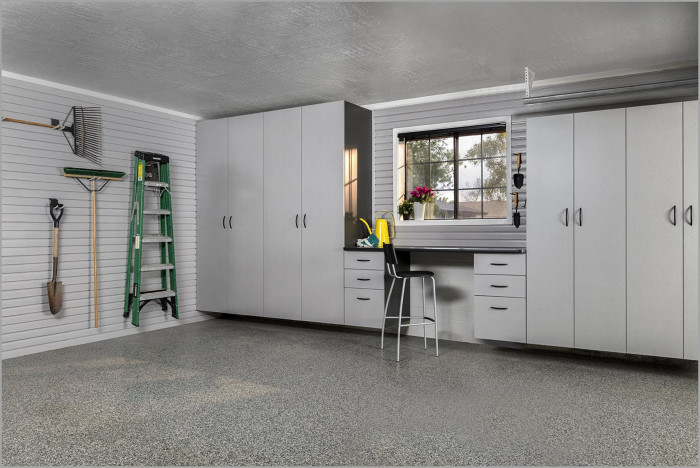 Custom organized garage with cabinets